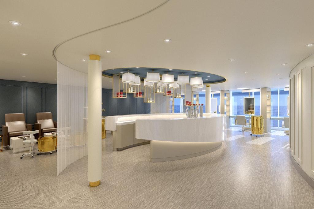 Elegantes Spa mit modernem, geschwungenem Tresen und gemütlichen Sitzbereichen.